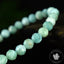 Bracelet Larimar perles 6mm rondes facettées AA