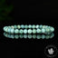Bracelet Larimar perles 6mm rondes facettées AA