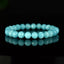 Bracelet Amazonite Bleue Glacée AAA perles 8mm rondes facettées - Amazonite de Glace , vertus de Stimulation - Communication - Mémoire