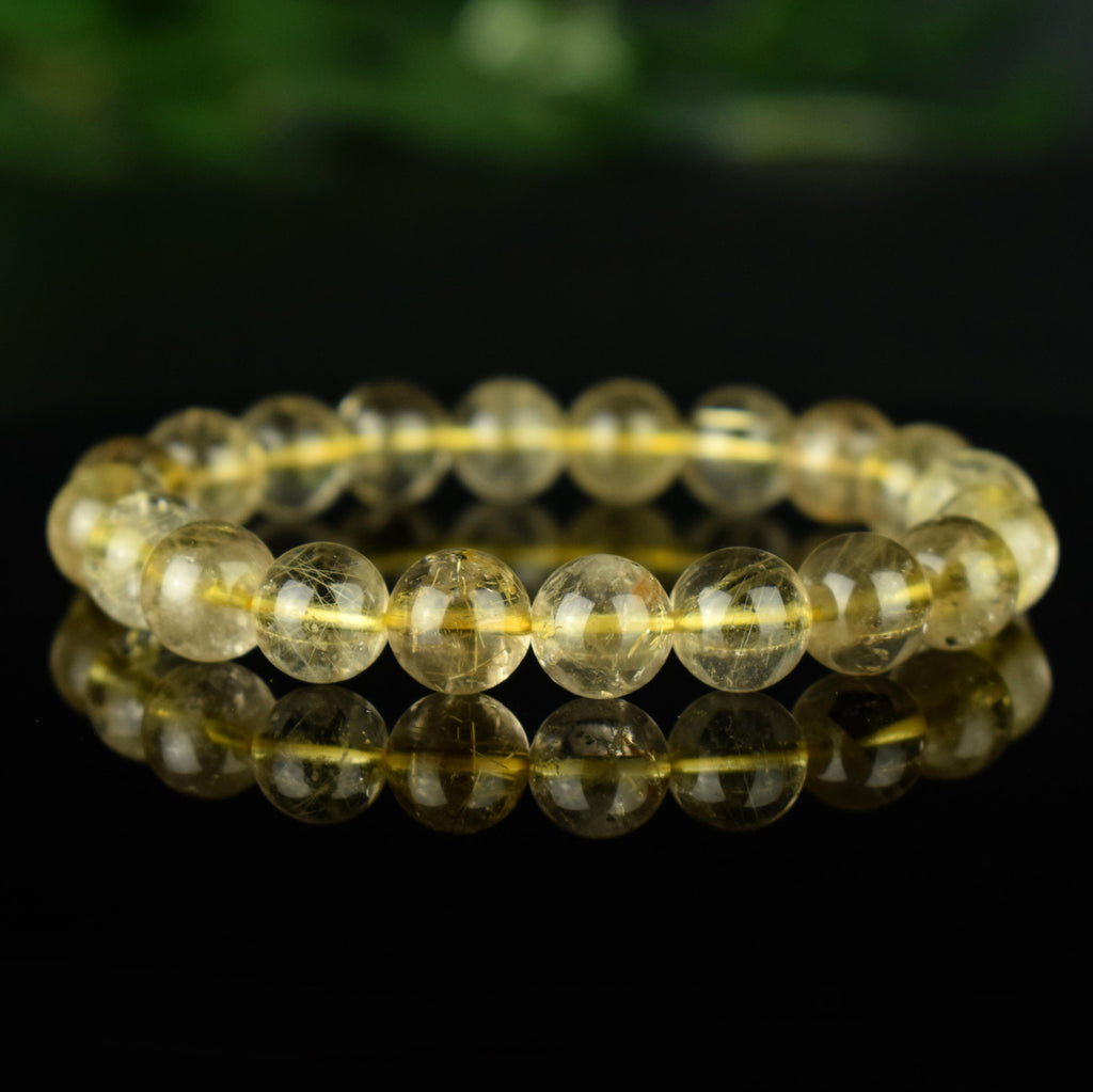 Bracelet Quartz Rutile doré 10mm perles rondes AAA