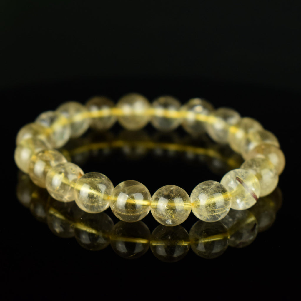 Bracelet Quartz Rutile doré 10mm perles rondes AAA