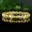 Bracelet Quartz Rutile doré 10mm perles rondes AAA