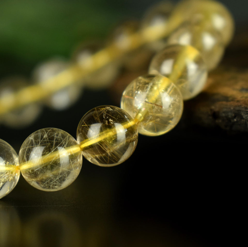 Bracelet Quartz Rutile doré 10mm perles rondes AAA