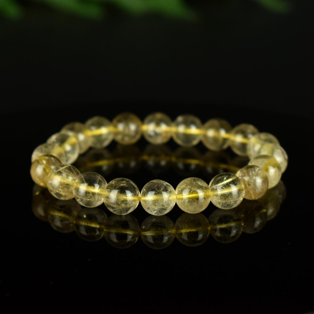 Bracelet Quartz Rutile doré 10mm perles rondes AAA