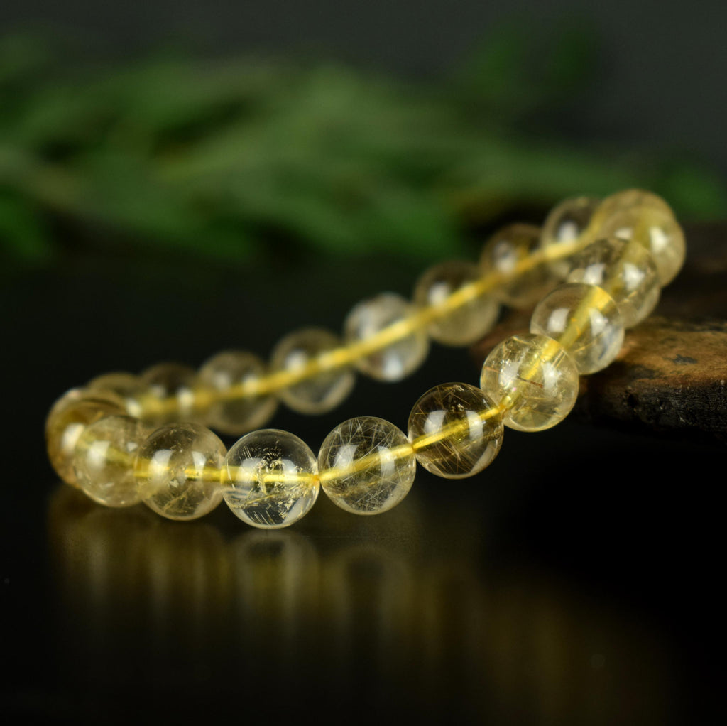 Bracelet Quartz Rutile doré 10mm perles rondes AAA
