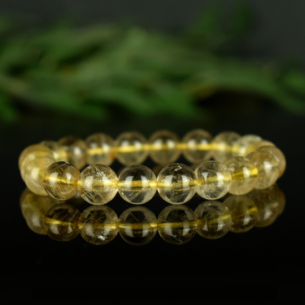 Bracelet Quartz Rutile doré 10mm perles rondes AAA