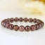 Bracelet Rubis étoilé non traité perles rondes 8mm du Mozambique - Pensée positive - Entretien - Stabilité