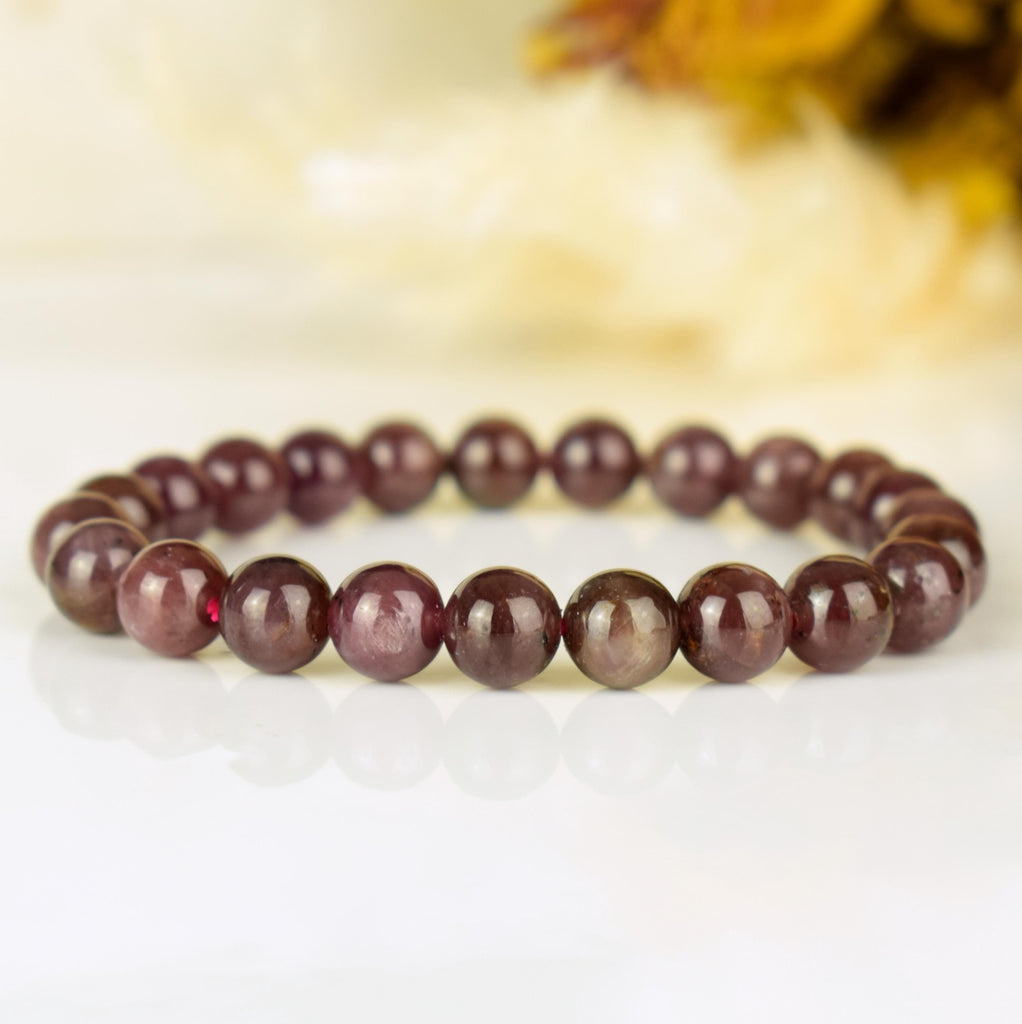 Bracelet Rubis étoilé non traité perles rondes 8mm du Mozambique - Pensée positive - Entretien - Stabilité