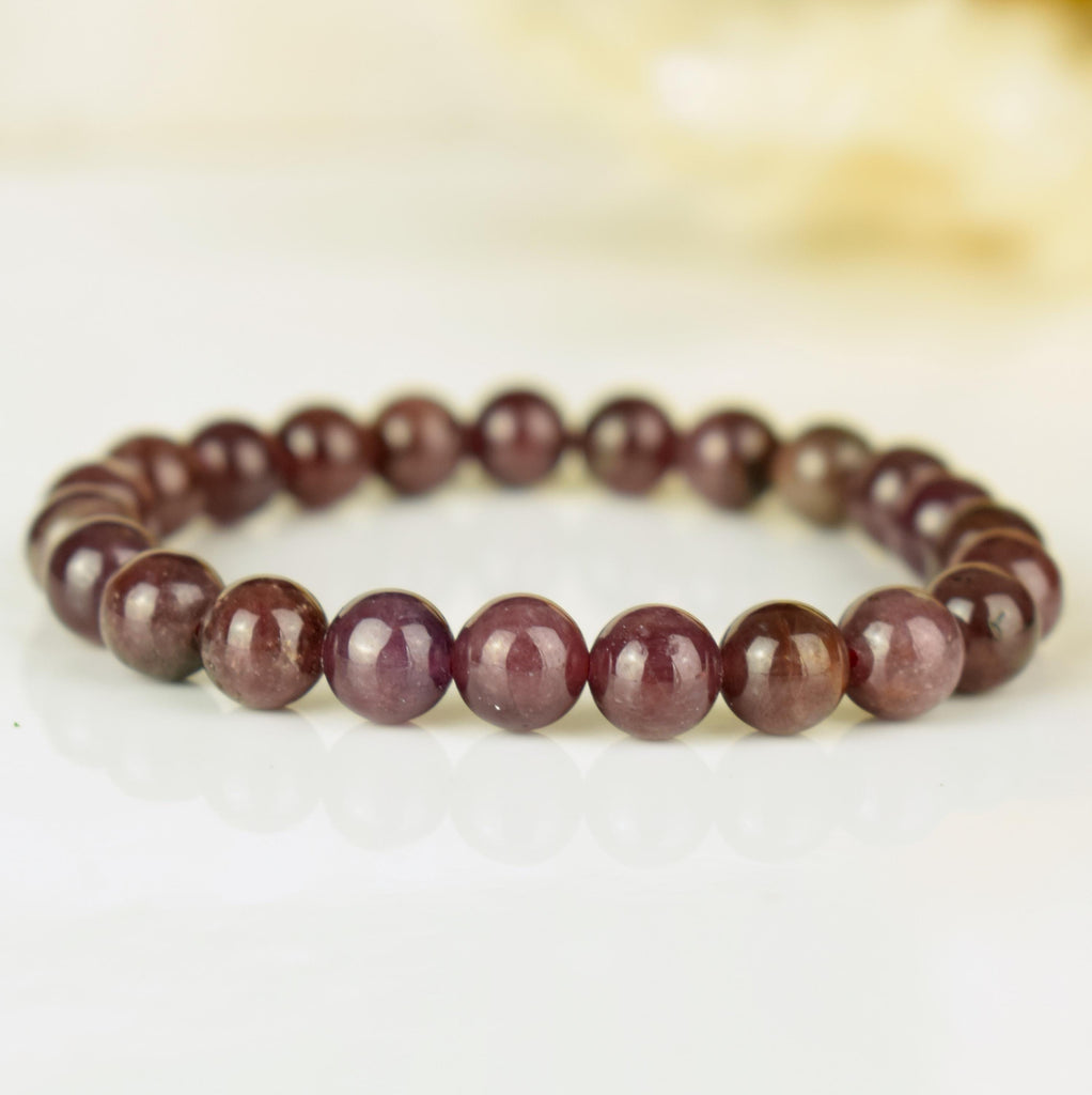 Bracelet Rubis étoilé non traité perles rondes 8mm du Mozambique - Pensée positive - Entretien - Stabilité